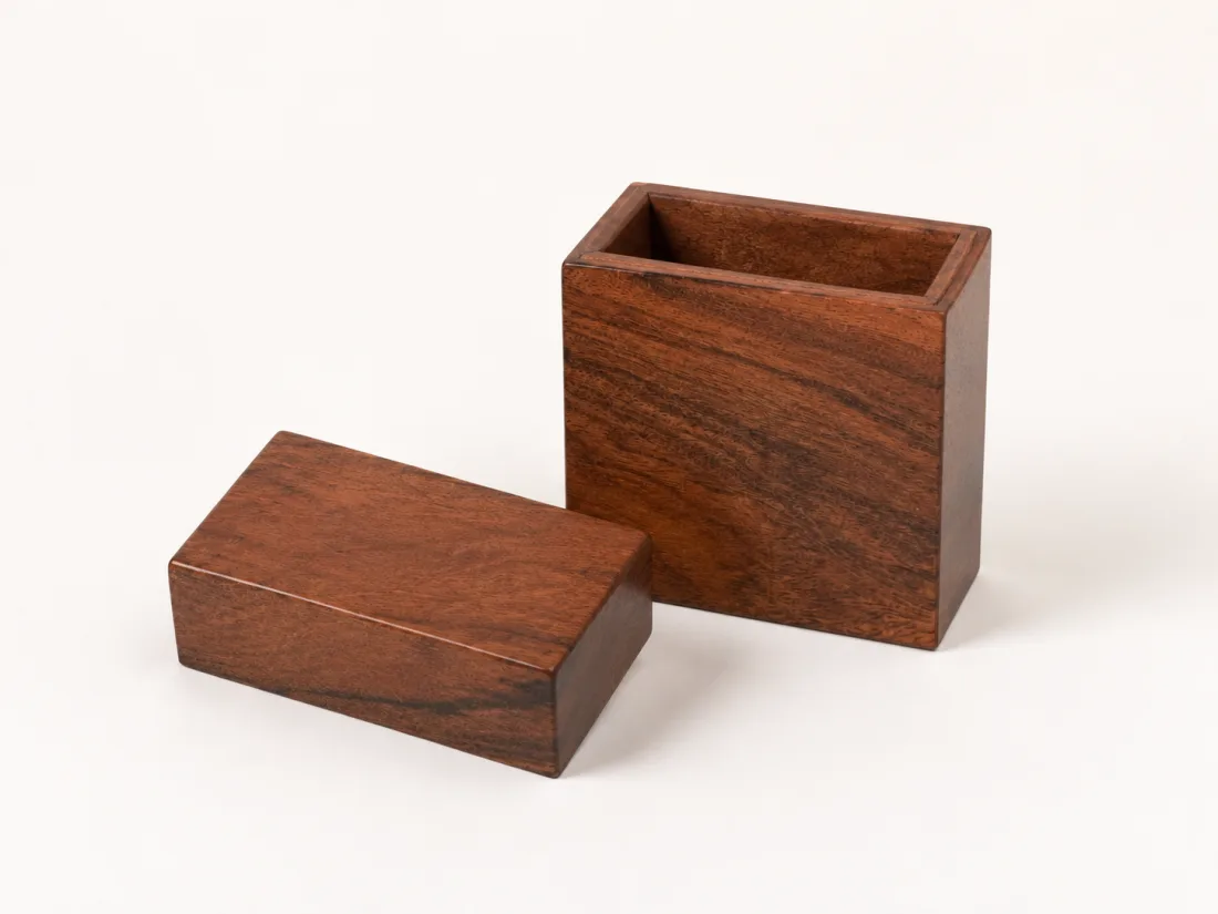 Reddish hardwood card box with a lift-off lid, sized for a deck of cards